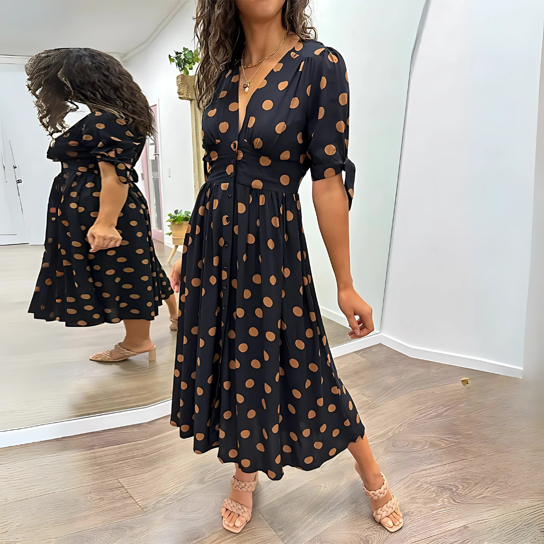 Robe mi-longue noire à pois