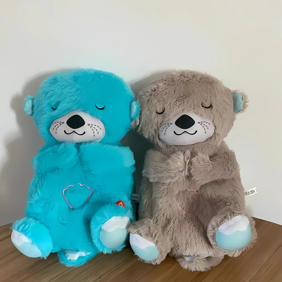 Peluche loutre interactive respirante et musicale