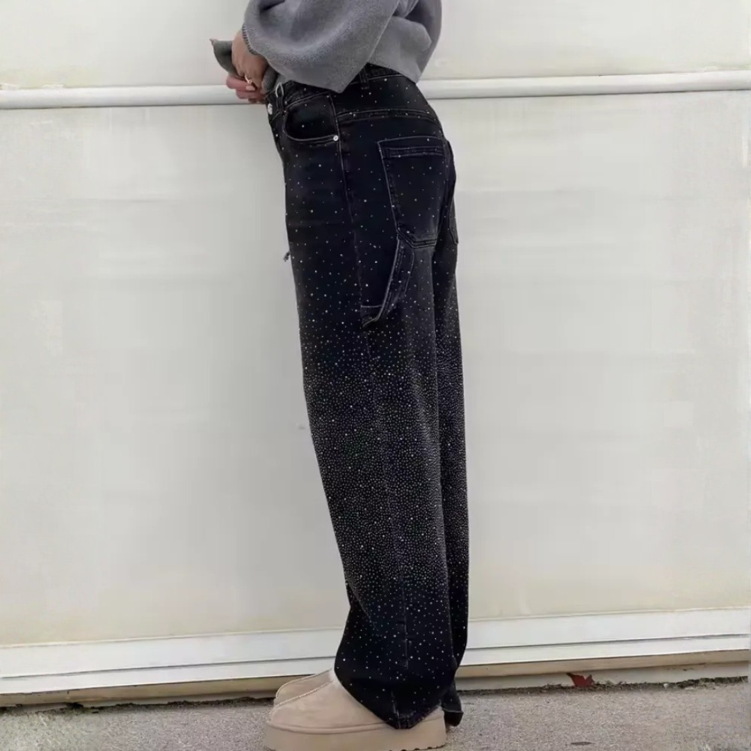 Jean femme taille haute coupe large effet usé