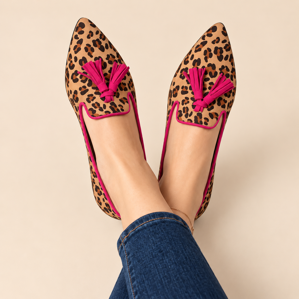 Mocassins léopard femme à pompons fuchsia