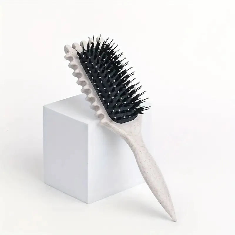 Brosse coiffante anti-frisottis