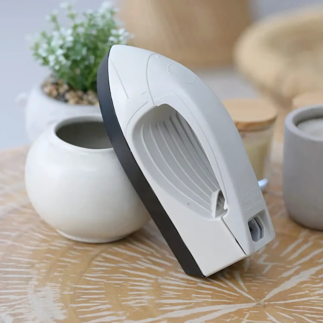 Mini ferro da stiro da viaggio senza fili