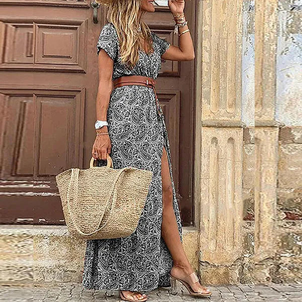 Maxi abito con spacco floreale
