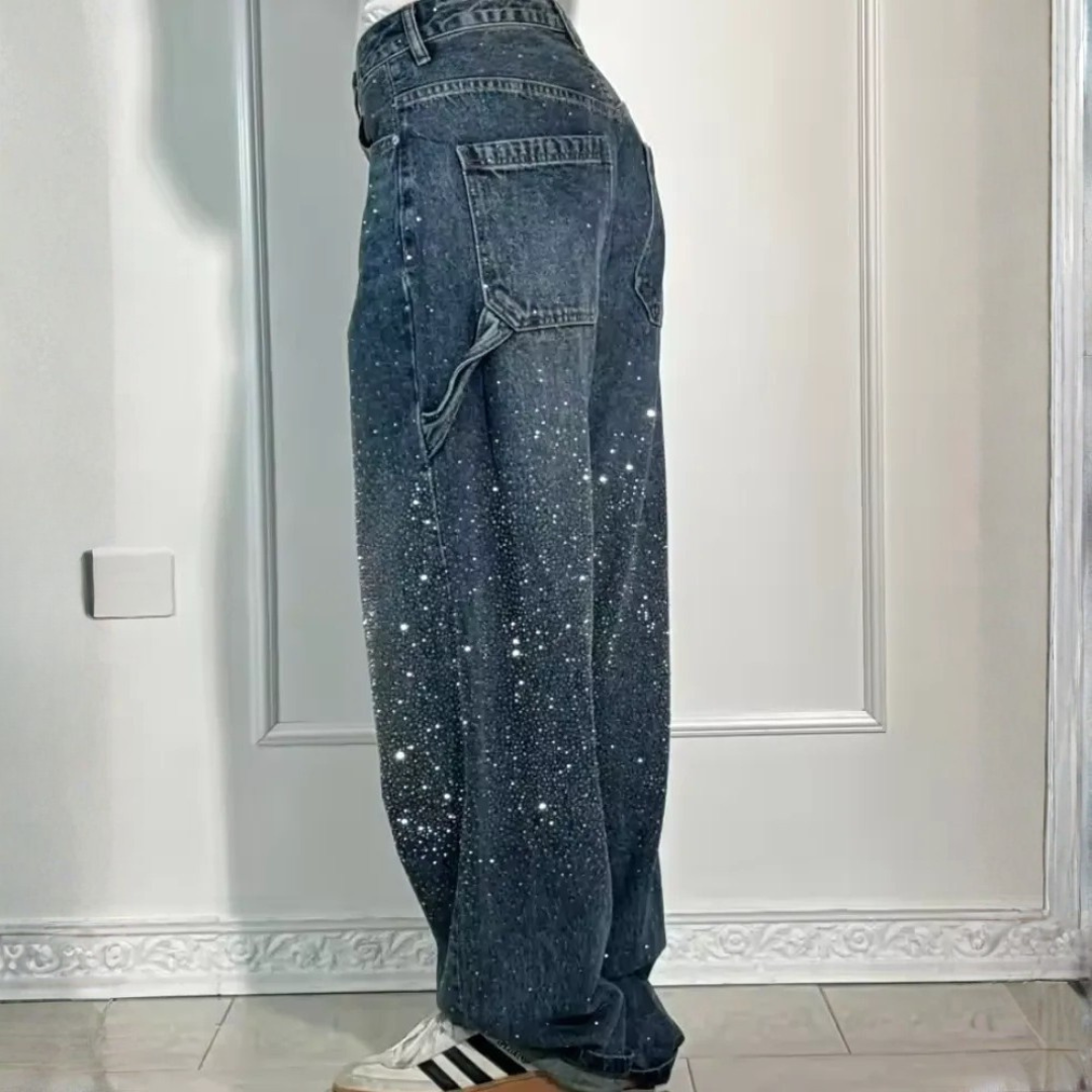 Jean femme taille haute coupe large effet usé