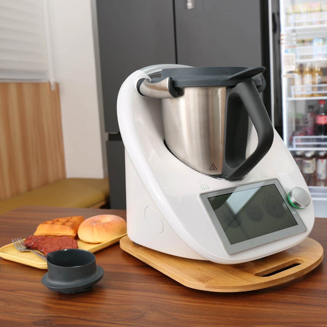 Planche coulissante de protection pour robot culinaire