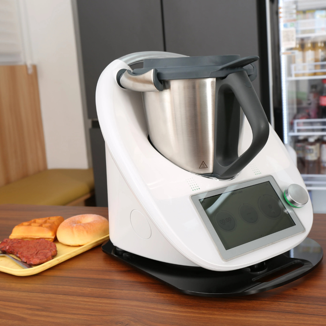 Planche coulissante de protection pour robot culinaire