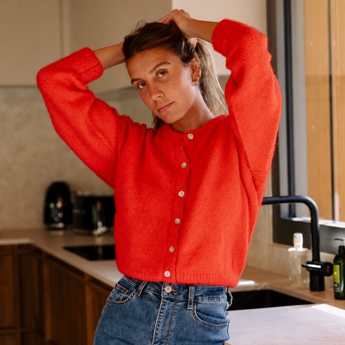 Gilet rouge ample en maille à boutons