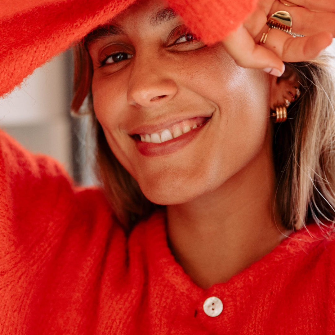 Gilet rouge ample en maille à boutons