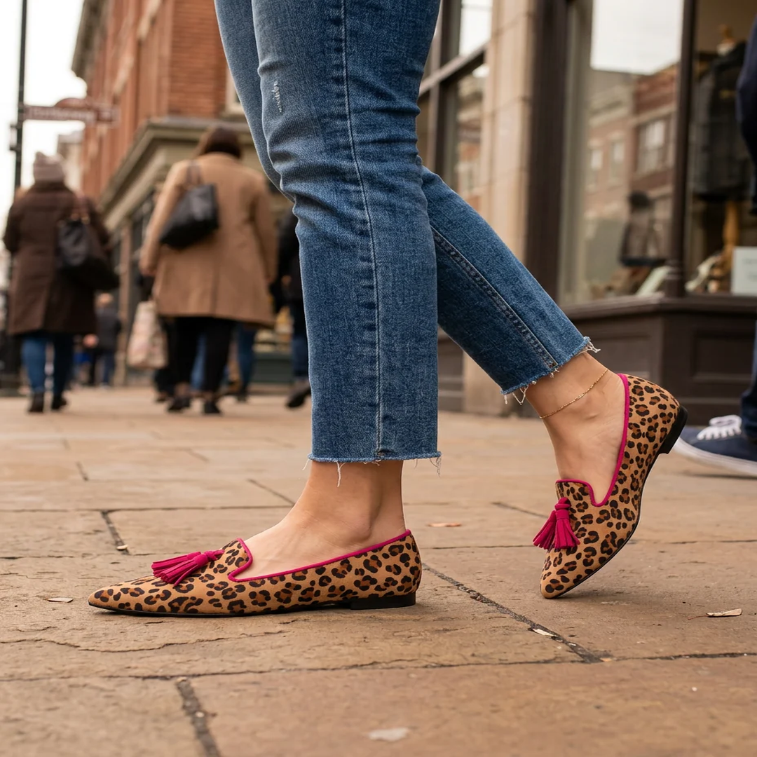 Mocassins léopard femme à pompons fuchsia