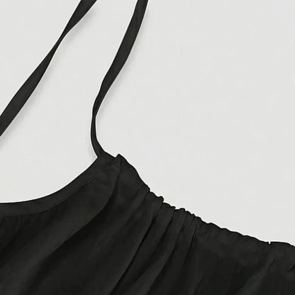 Langes, fließendes Kleid mit schmalen Trägern