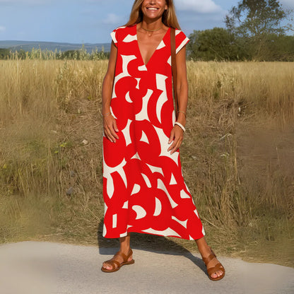 Maxi abito con scollo a V e stampa romantica