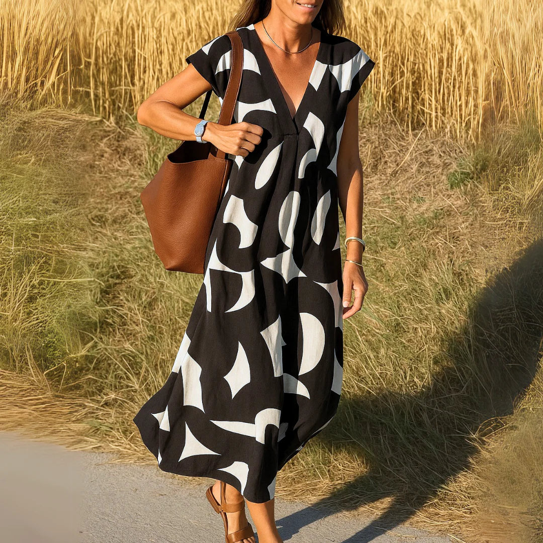 Maxi abito con scollo a V e stampa romantica