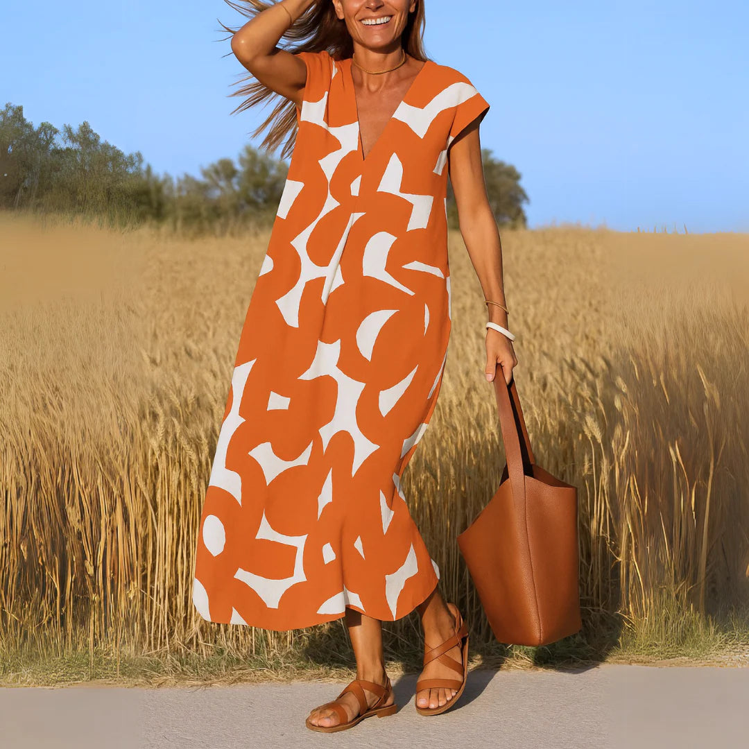 Maxi abito con scollo a V e stampa romantica