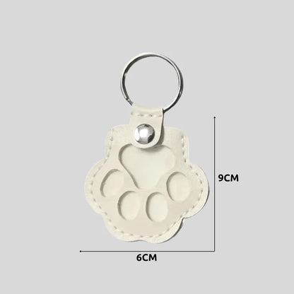 Schlüsselanhänger in lino - Pfotenform für Tierfreunde